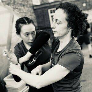 2 female training martial arts